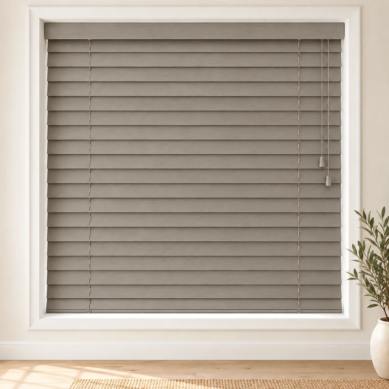 Taupe shown as a full blind in a neutral room