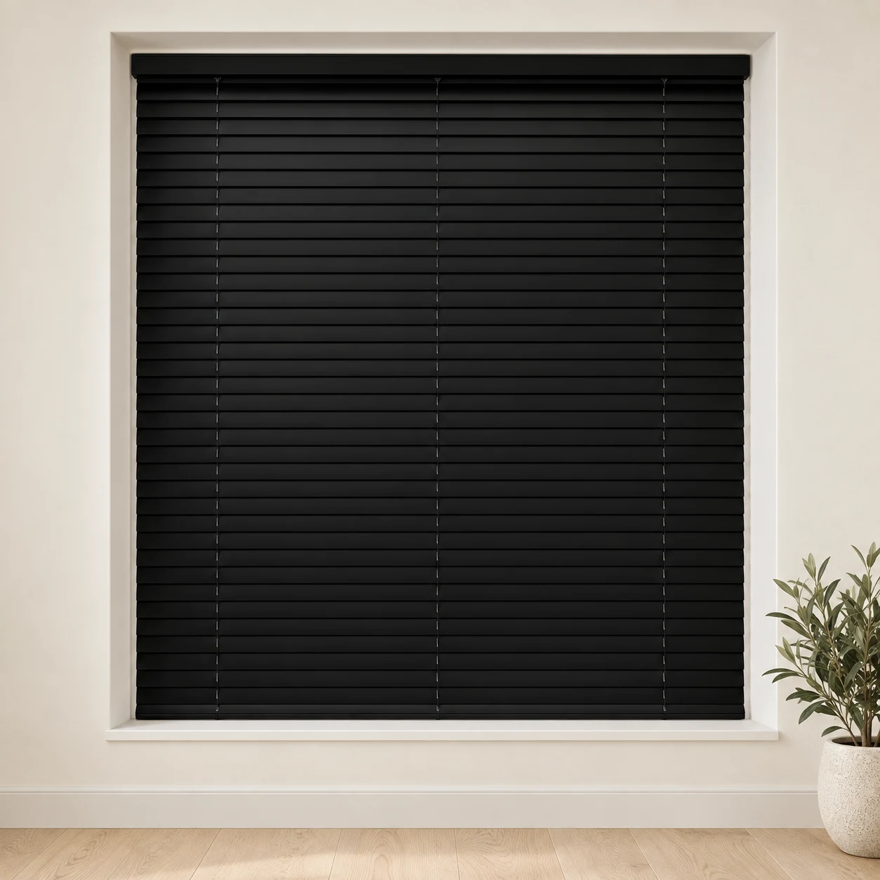 Black shown as a full blind in a neutral room