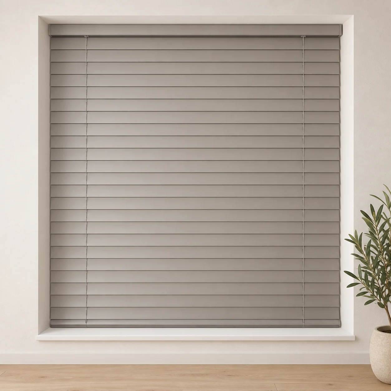 Aluminium shown as a full blind in a neutral room