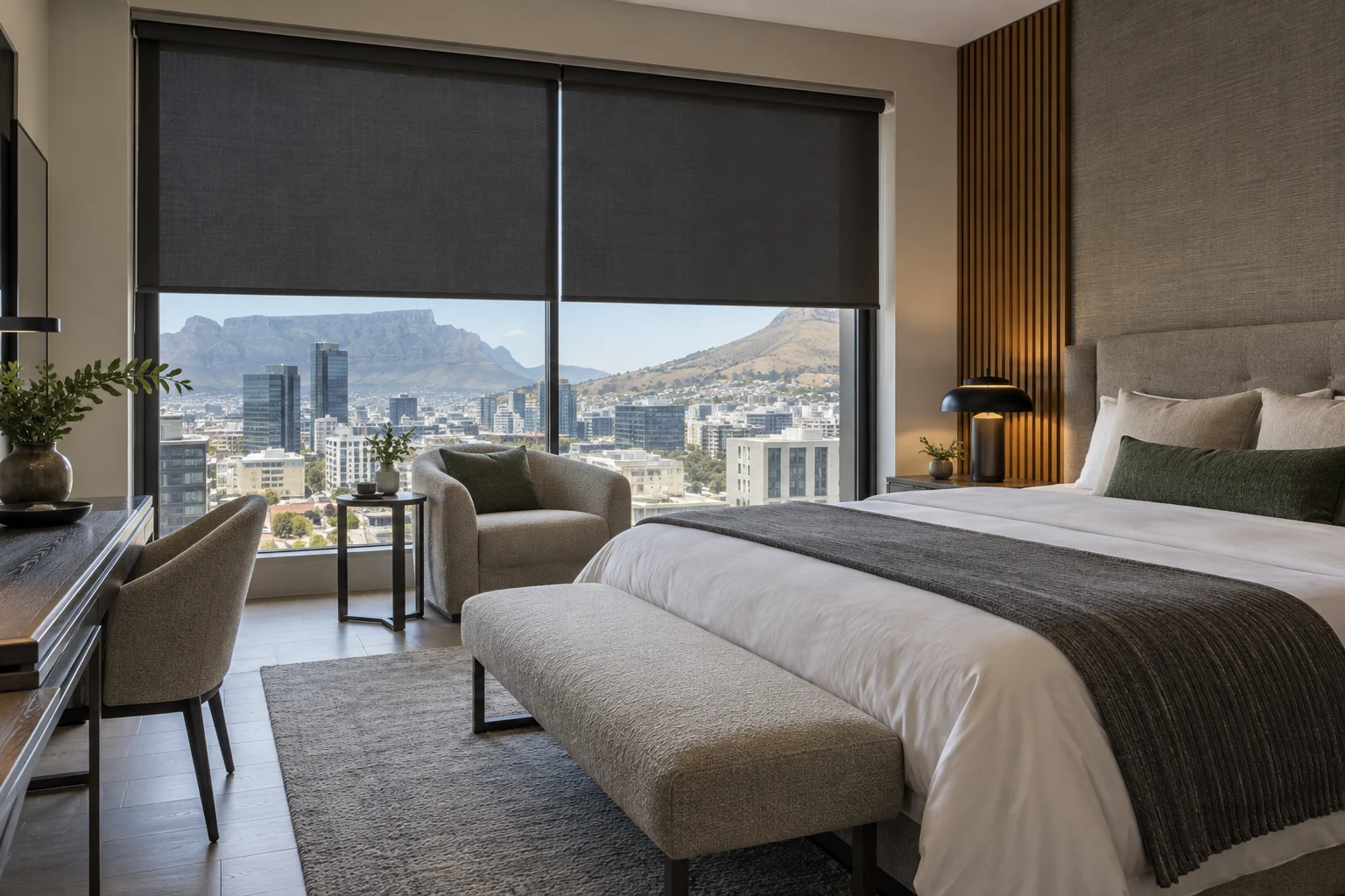 City hotel room: modern city hotel king bedroom, charcoal blackout roller blinds partially lowered, linen bedding